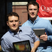 Chris, left, and David Sinkinson show off their app.